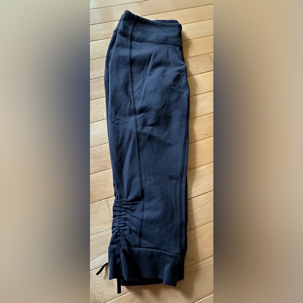 REI women's black leggings with ruched side-size small